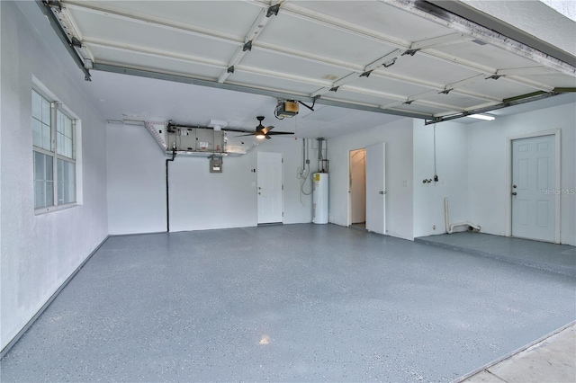 2912 Pinecrest Way, Sarasota, FL 34239 - garage featuring water heater and a garage door opener
