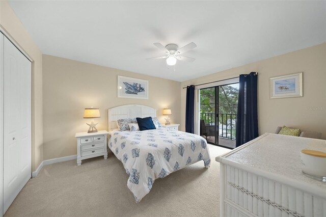 bedroom with access to exterior, ceiling fan, a closet, and light colored carpet