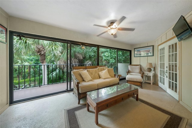 sunroom with ceiling fan and french doors