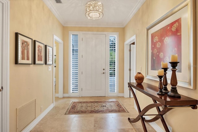 entrance foyer featuring ornamental molding