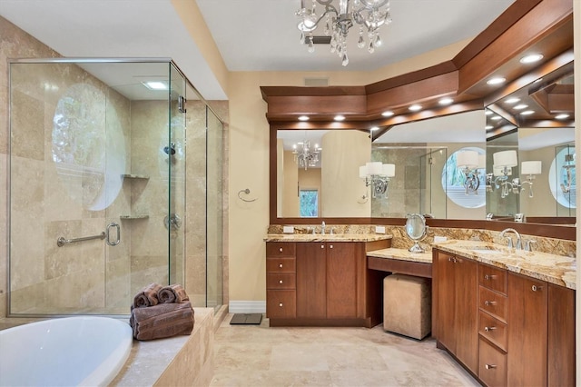 bathroom featuring a notable chandelier, lofted ceiling, vanity, and separate shower and tub