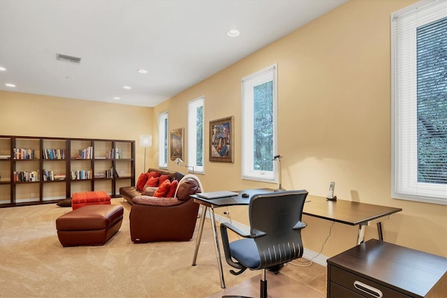 sitting room with light carpet, baseboards, visible vents, and recessed lighting