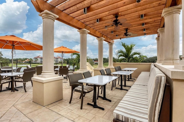 view of patio / terrace with ceiling fan, outdoor dining area, and an outdoor living space