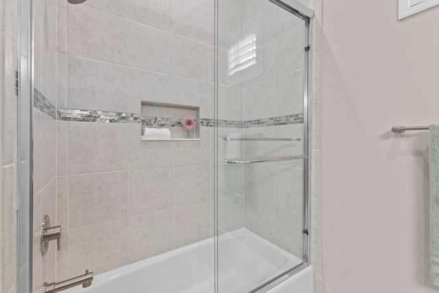 bathroom featuring enclosed tub / shower combo