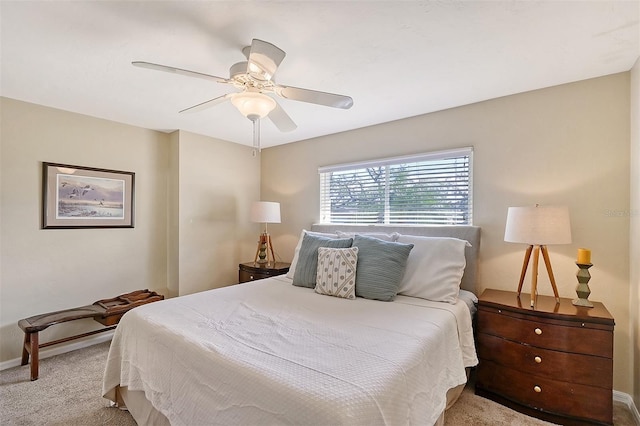 1833 Sandalwood Dr, Sarasota, FL 34231 - carpeted bedroom with baseboards and ceiling fan