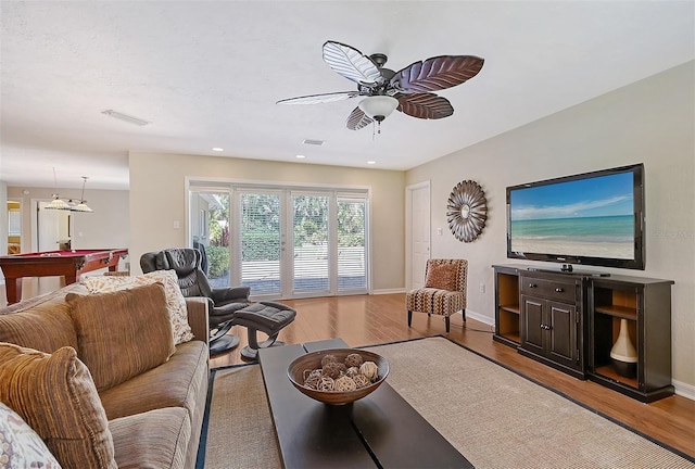 1833 Sandalwood Dr, Sarasota, FL 34231 - living room featuring billiards, wood finished floors, ceiling fan, baseboards, and recessed lighting