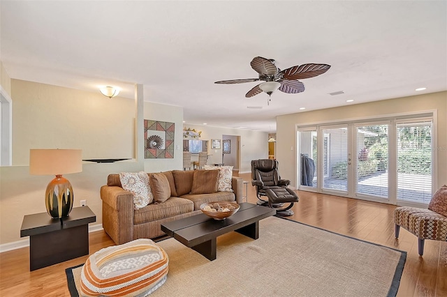 1833 Sandalwood Dr, Sarasota, FL 34231 - living room with light wood-style floors, a ceiling fan, and recessed lighting