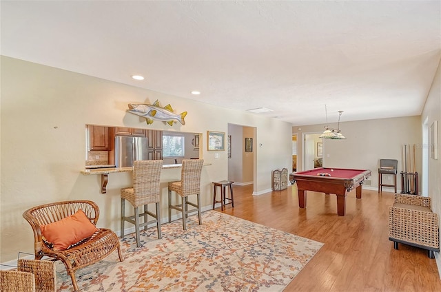 playroom featuring billiards and light hardwood / wood-style flooring