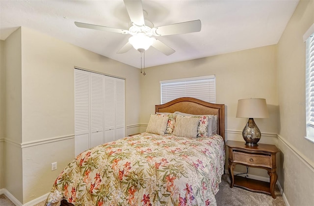 1833 Sandalwood Dr, Sarasota, FL 34231 - carpeted bedroom featuring a closet, a ceiling fan, and baseboards