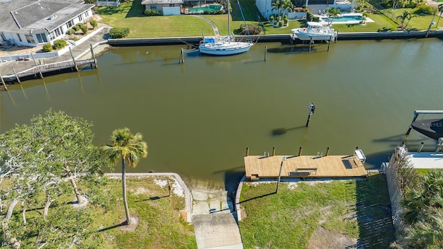 bird's eye view with a water view