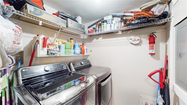 laundry area featuring washing machine and dryer