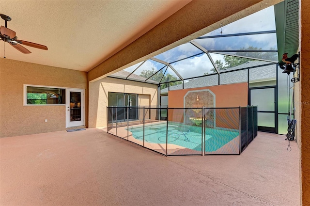 view of pool with a lanai and a patio