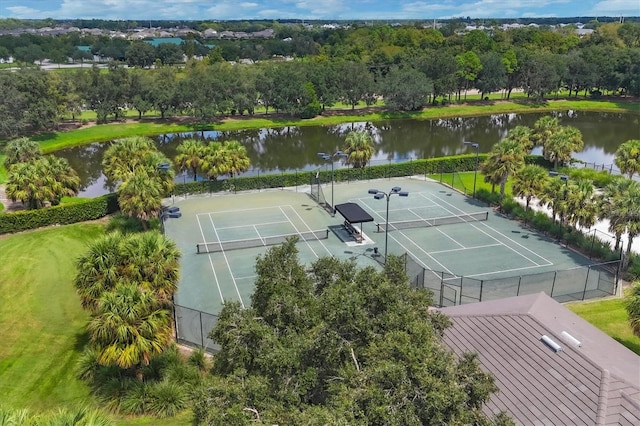 drone / aerial view with a water view