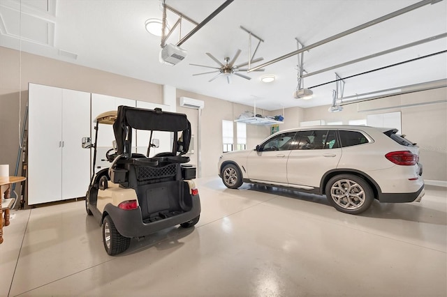 garage featuring a garage door opener and a wall mounted air conditioner