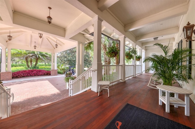 wooden terrace featuring a porch