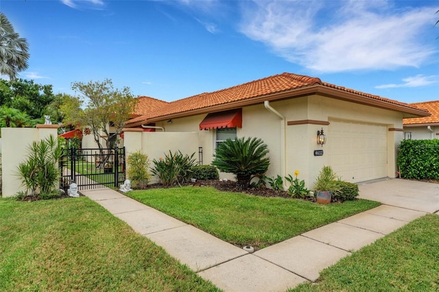 view of front facade featuring a garage and a front yard