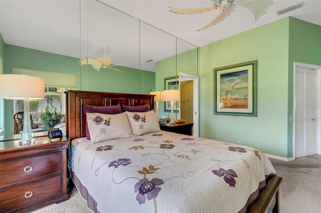 carpeted bedroom featuring ceiling fan