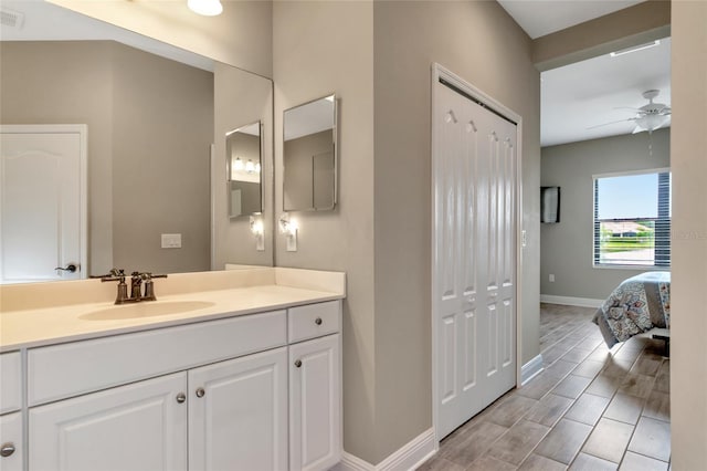 bathroom with vanity and ceiling fan