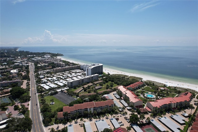 bird's eye view featuring a beach view and a water view