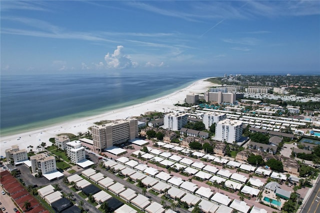 bird's eye view featuring a beach view and a water view