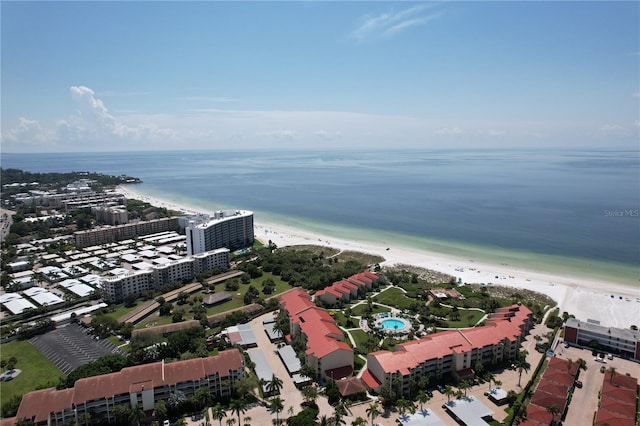 bird's eye view with a water view and a view of the beach