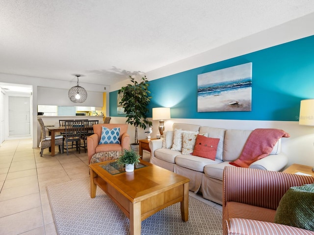 tiled living room with a textured ceiling