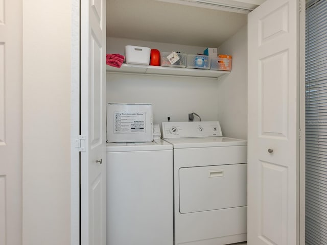 washroom with independent washer and dryer