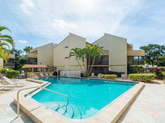 view of pool featuring a patio area