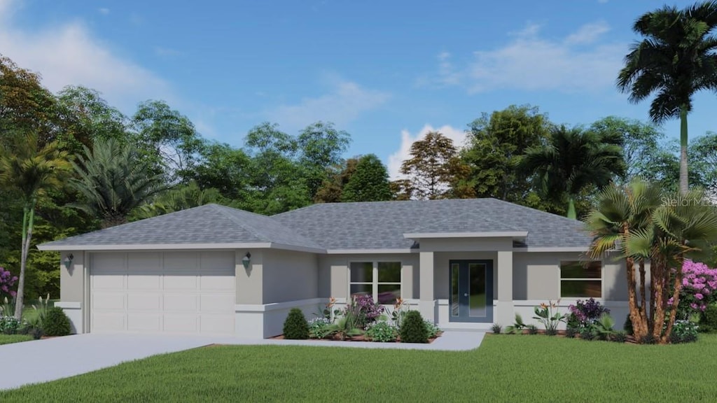 view of front of home featuring a front yard and a garage