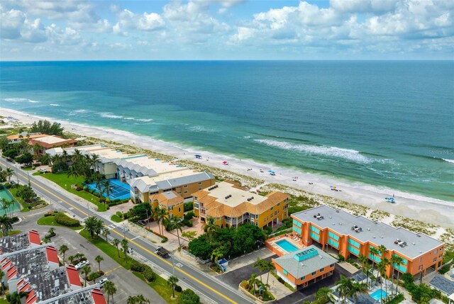 aerial view with a water view and a view of the beach