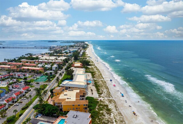 drone / aerial view featuring a view of the beach and a water view