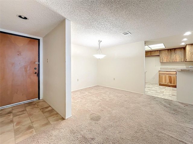 2587 Countryside Blvd Unit 6111, Clearwater, FL 33761 - interior space featuring recessed lighting, visible vents, light carpet, light tile patterned flooring, and a textured ceiling