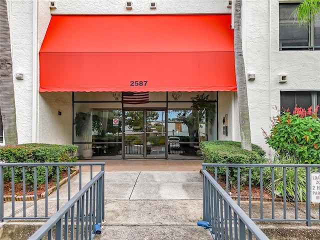 2587 Countryside Blvd Unit 6111, Clearwater, FL 33761 - view of exterior entry with stucco siding