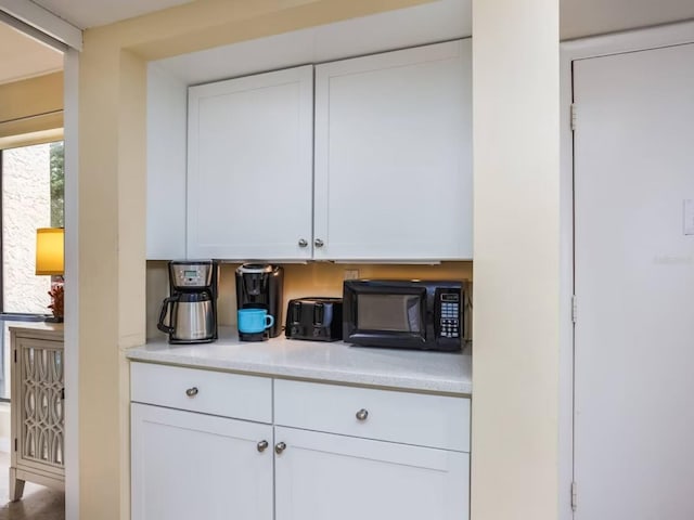 kitchen with white cabinetry