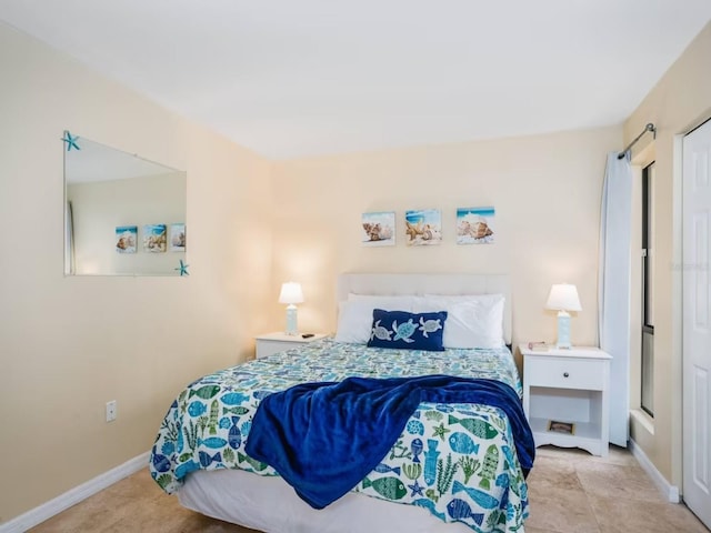 bedroom with light tile patterned flooring