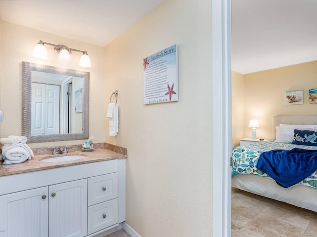 bathroom featuring vanity and tile patterned flooring