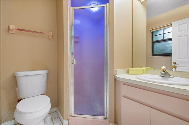 bathroom featuring a shower with shower door, vanity, a textured ceiling, tile patterned flooring, and toilet