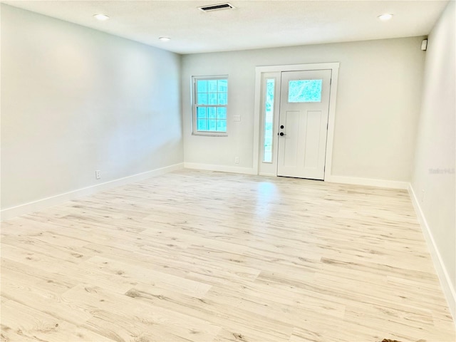 foyer entrance featuring light hardwood / wood-style flooring