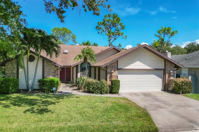 single story home with a garage and a front yard