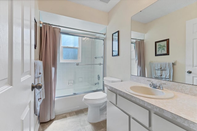 full bathroom with vanity, toilet, and shower / tub combo with curtain