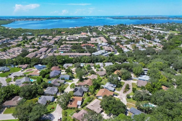 drone / aerial view with a water view