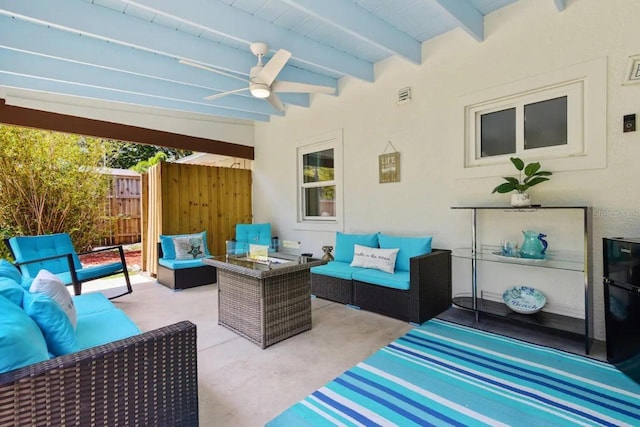 view of patio / terrace with outdoor lounge area, a ceiling fan, and fence