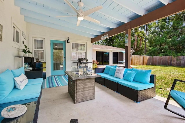 view of patio with an outdoor hangout area, fence, visible vents, and a ceiling fan