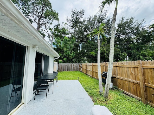 view of patio with a fenced backyard
