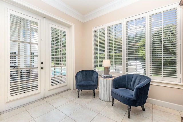 living area with light tile patterned flooring and ornamental molding