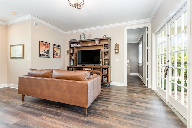 living room featuring crown molding and dark hardwood / wood-style flooring