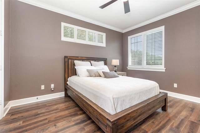 bedroom featuring ceiling fan, dark hardwood / wood-style floors, and crown molding