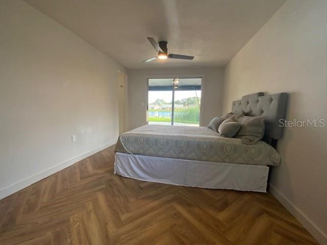 bedroom featuring parquet flooring and ceiling fan