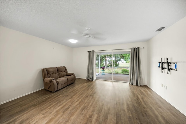 3653 Bonaventure Ct, Sarasota, FL 34243 - unfurnished room featuring wood finished floors, ceiling fan, and baseboards