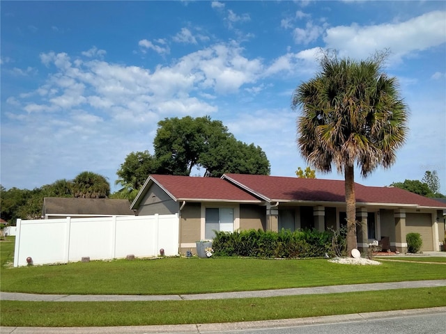 view of front of house with a front lawn